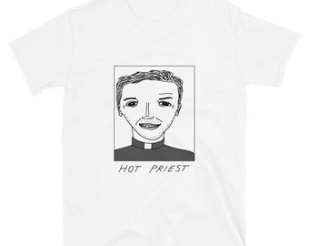 May include: White t-shirt with a black and white illustration of a man with a smile and the text "HOT PRIEST" underneath.