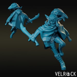 May include: A blue 3D printed miniature of a fantasy elf warrior with pointed ears, a hooded cloak, and two daggers. The elf is running forward with one dagger raised in the air.