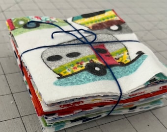 31 Four inch flannel fabric squares, brights