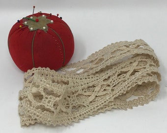 Very old lace, tiny flower