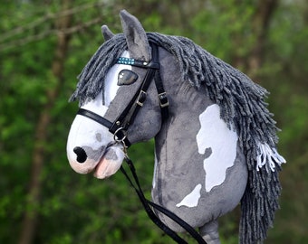 GREY and WHITE spotted hobby horse with tack/bridle