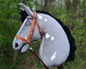 SMALLER SIZE: grey-white hobby horse with bridle