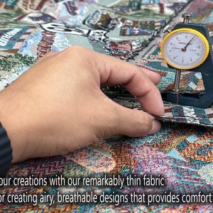 May include: Close-up of a hand holding a fabric measuring tool, showing the thinness of the fabric. The fabric is colorful and patterned. The text "Elevate your creations with our remarkably thin fabric perfect for creating airy, breathable designs that provides comfort and style" is visible at the bottom of the image.