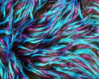 May include: Close-up of a vibrant, textured fabric with long, shaggy fibers. The material features a dynamic blend of colors, including bright turquoise, deep purple, and black, creating a visually striking and abstract pattern. This textile is suitable for various craft projects.