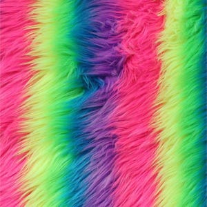 May include: A close-up of a rainbow-coloured faux fur fabric. The fabric has vertical stripes of bright pink, yellow-green, blue-green, purple, and pink. The long, soft fibres create a textured, plush appearance.
