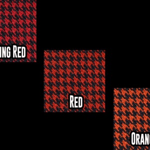 May include: Three fabric swatches in a houndstooth pattern. The swatches are labelled "Racing Red", "Red", and "Orange".