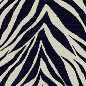 May include: A close-up of a fabric with a zebra stripe pattern. The pattern features alternating cream-colored and navy blue stripes. The fabric has a woven texture, and the stripes are irregular and curved, creating a dynamic visual effect.