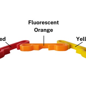 Red, bright orange, and yellow drawstring bag clips