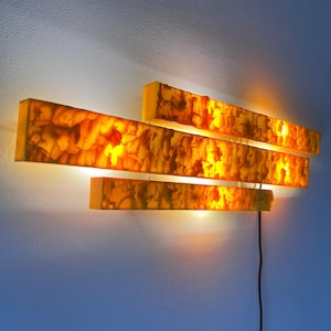 Wall lamp yellow by Uwe Mersch