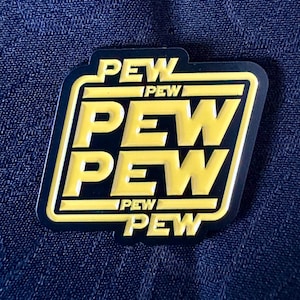 Blaster Echoes Enamel Pin