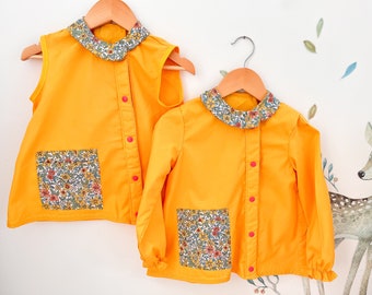 Tablier maternelle enfant , blouse d’écolier, rentrée scolaire