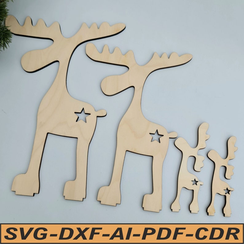 Set of four stained wooden reindeer figures of different sizes arranged on a white surface with star cutouts, red noses, and tartan ribbon bows, displayed next to vector format tags.