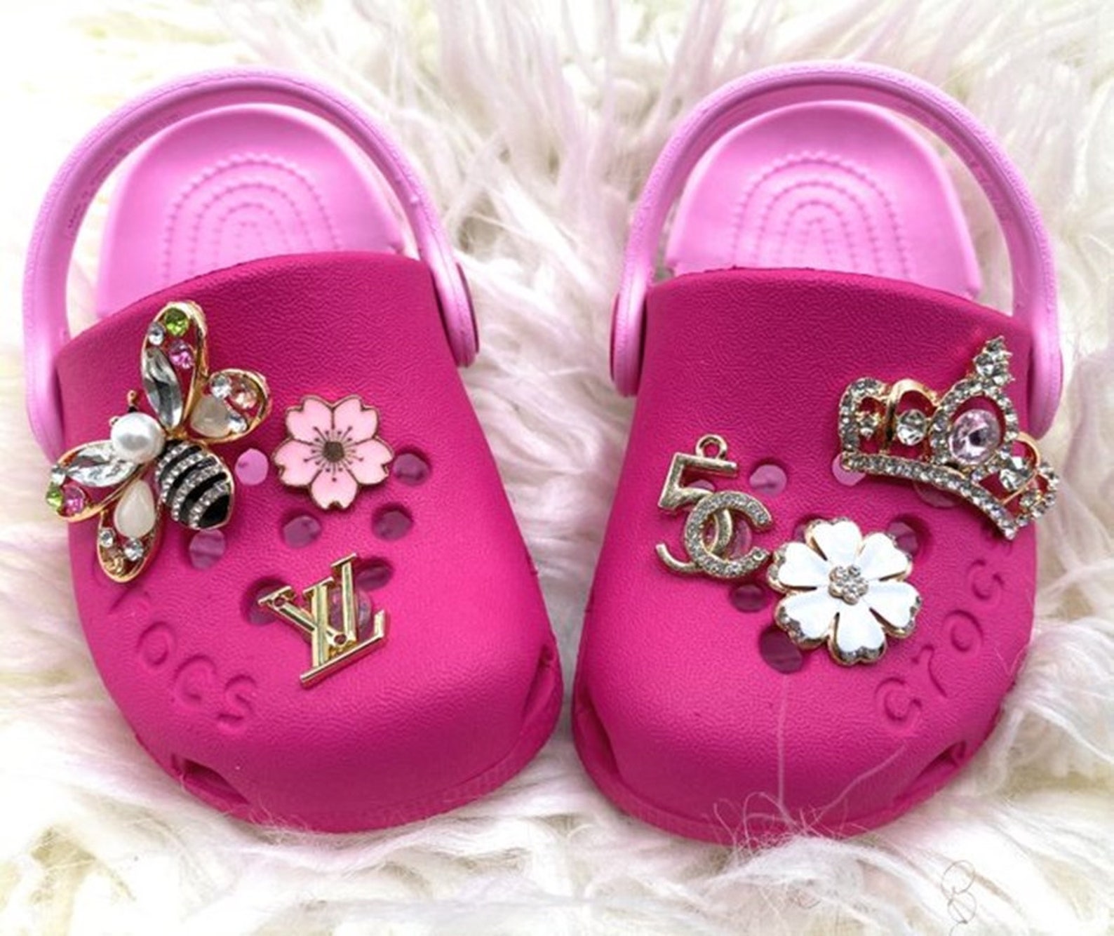 pink crocs with charms