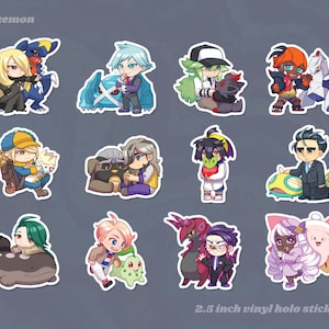 May include: A set of twelve 2.5 inch vinyl holo stickers featuring chibi-style characters paired with various creatures. The stickers display diverse figures in colorful outfits alongside stylized monsters. The text "pokemon" and "2.5 inch vinyl holo stickers" is visible.