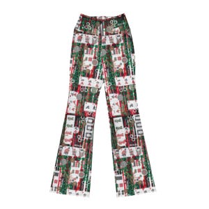 May include: High-waisted, flared pants with a repeating pattern of playing cards, coins, and other decorative elements in red, green, white, and black. The pants have a button and zipper closure.