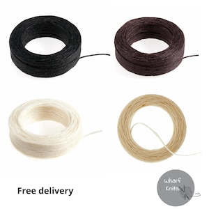 May include: Four spools of waxed linen thread in black, brown, white, and beige. The spools are arranged in a grid pattern on a white background. Free delivery is mentioned below the image.