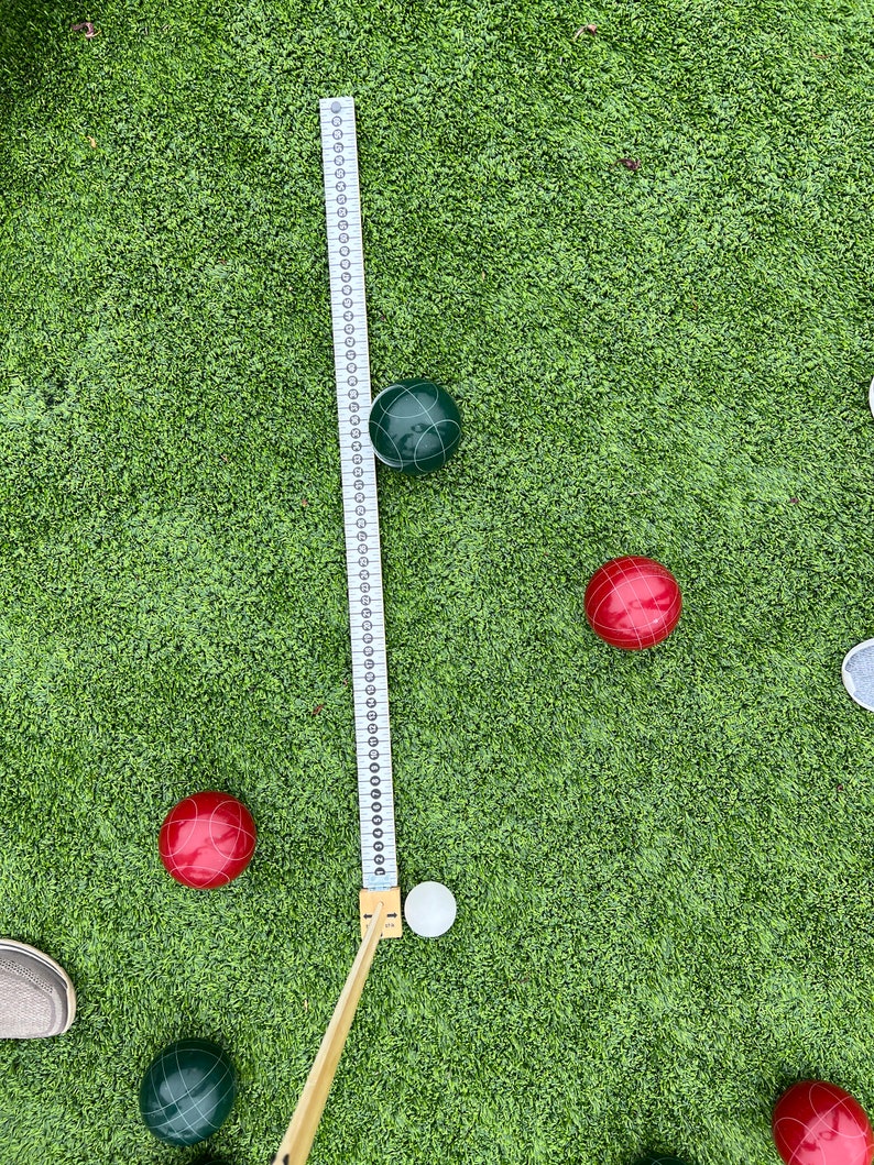 Boccestik A Bocce Ball Measuring Device. Never Squat Again to Measure