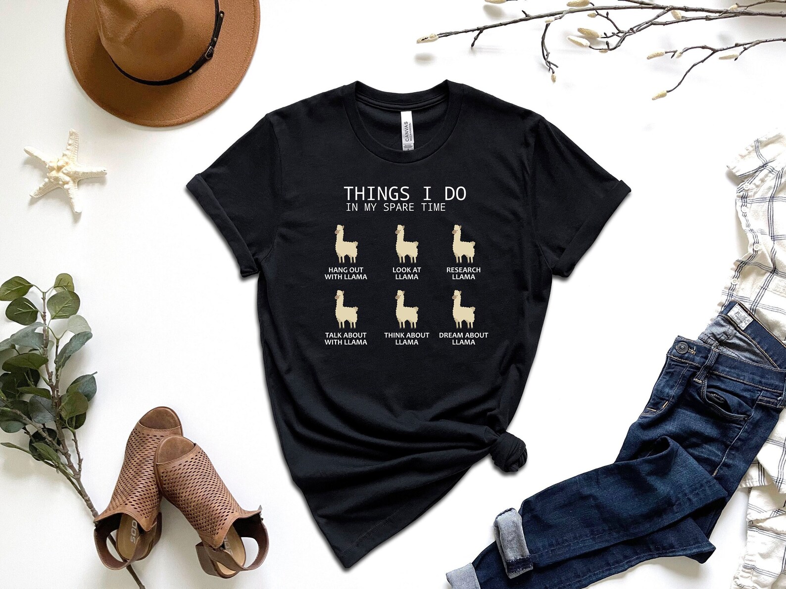black T-shirt with multiple Llamas on it