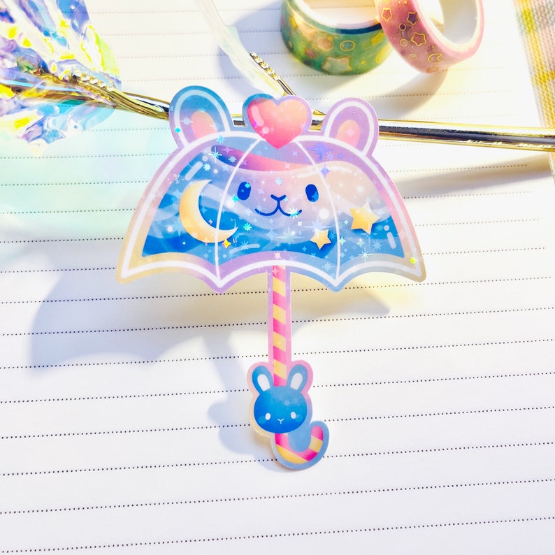 Kawaii Pastel Aesthetic Umbrella Bunny Rabbit Usagi Pink Blue Rainbow Moon Stars Holographic Glossy Sticker 2.5 x 3 Holographic - Blue