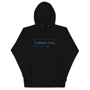 May include: Black hooded sweatshirt with a blue box around the text "LURING TAIL Apparel" in blue.