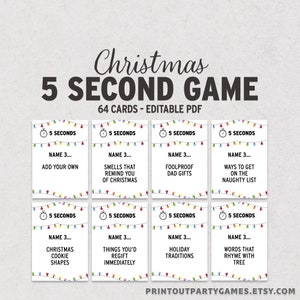 May include: A set of Christmas-themed game cards. The cards are white with colorful string lights and feature prompts like "Name 3...Smells that remind you of Christmas." The game is called "5 Second Game."