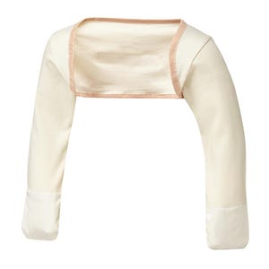 May include: Cream-coloured bolero shrug with long sleeves. The bolero features a square neckline with a light brown trim. The sleeves end in a cuff. The fabric appears to be a soft, lightweight material.