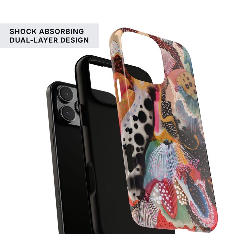 May include: A dual-layer phone case featuring a colorful abstract pattern with organic shapes, dots, and lines in shades of orange, pink, black, and white. The text SHOCK ABSORBING DUAL-LAYER DESIGN is visible. The case is shown with a black inner layer.