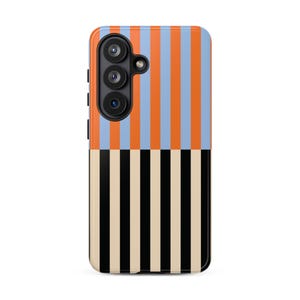 May include: A rectangular phone case featuring a vertical striped pattern. The top half displays alternating orange and light blue stripes, while the bottom half features alternating black and cream stripes. The case includes a triple camera cutout.