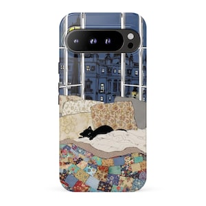 May include: A smartphone case featuring an illustration of a black cat resting on a bed with patterned pillows and a colorful patchwork quilt. The scene is set in front of a large window overlooking a dark blue cityscape at night with lit windows.