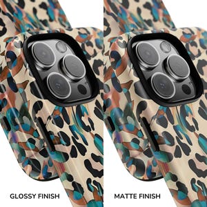 May include: Close-up of two phone cases with a leopard print design in beige, black, brown, and teal. One case has a glossy finish, and the other has a matte finish. The text "GLOSSY FINISH" and "MATTE FINISH" are at the bottom.