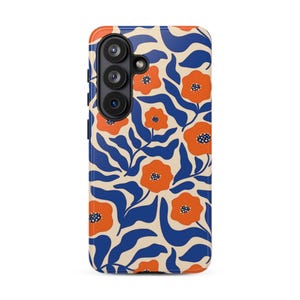 May include: A rectangular smartphone case featuring a cream-colored background with a repeating pattern of vibrant orange flowers and deep blue wavy leaves. The case includes a black camera module cutout with three circular lenses.
