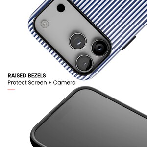 May include: A smartphone case featuring a blue and white vertical striped pattern. The case has a black frame with raised bezels to protect the screen and camera. Text on the image reads: RAISED BEZELS Protect Screen + Camera.