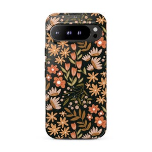 May include: A black smartphone case featuring a repeating pattern of orange, peach, and cream-colored flowers, buds, and green leaves. The design covers the entire back of the case, including the area around the horizontal camera module.