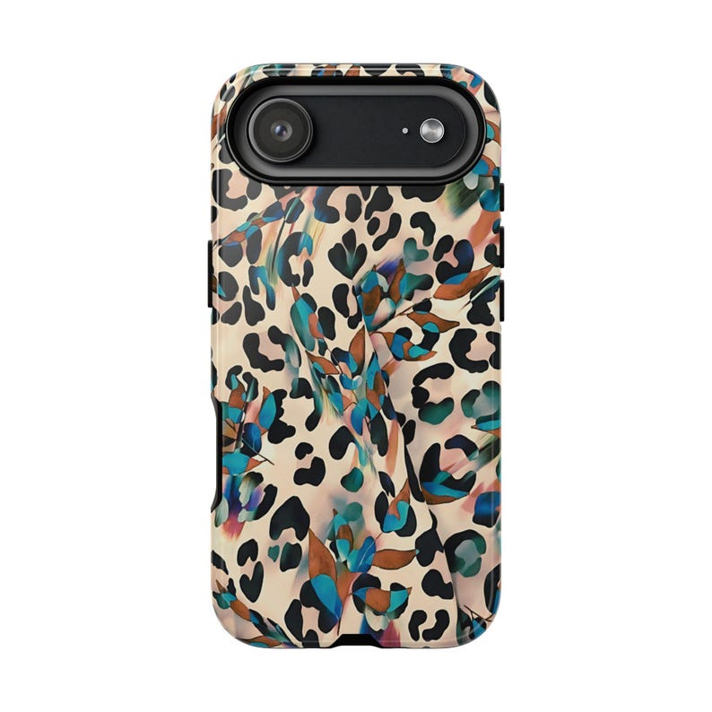 May include: A phone case with a unique design. The case features a beige background with black leopard spots and colorful floral accents in shades of blue, green, and brown. The camera lens is visible at the top.