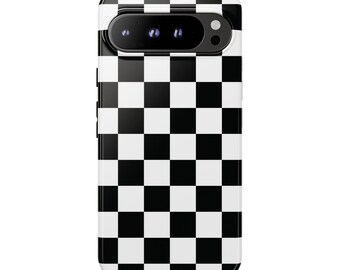 May include: A smartphone case featuring a high-contrast black and white checkered pattern across the entire back surface. The case includes a horizontal camera cutout at the top, revealing three circular camera lenses and a flash component.