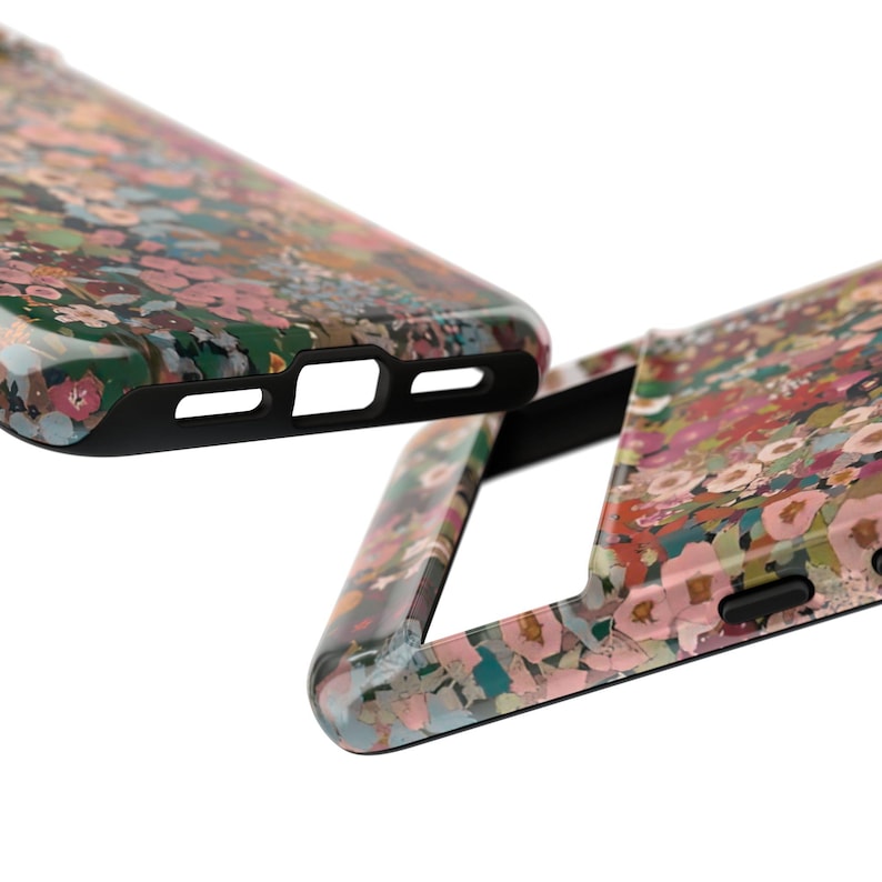 May include: Two mobile phone cases featuring a dense, multi-colored floral pattern with shades of pink, green, blue, and white. The cases have a glossy finish, black interior edges, and precise cutouts for charging ports and side buttons.