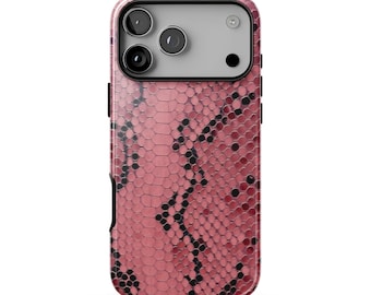 May include: A smartphone case featuring a pink and black snakeskin pattern. The back of the case displays a textured, repeating scale design with dark spots. The top section includes a rectangular cutout for a triple-lens camera system.
