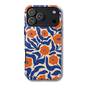 May include: A phone case with a floral pattern. The case features a cream-colored background with orange flowers and blue leaves. The phone's camera lenses are visible at the top.