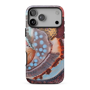 May include: A smartphone case featuring an abstract design with a mix of light blue, orange, and dark brown tones. The pattern includes various circular shapes, dotted textures, and flowing lines that cover the entire back surface of the device.
