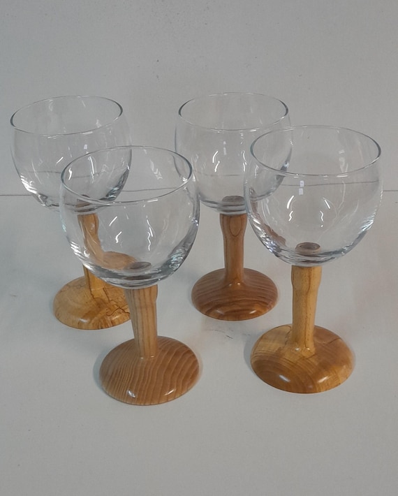 Wine glass with a wooden stem.