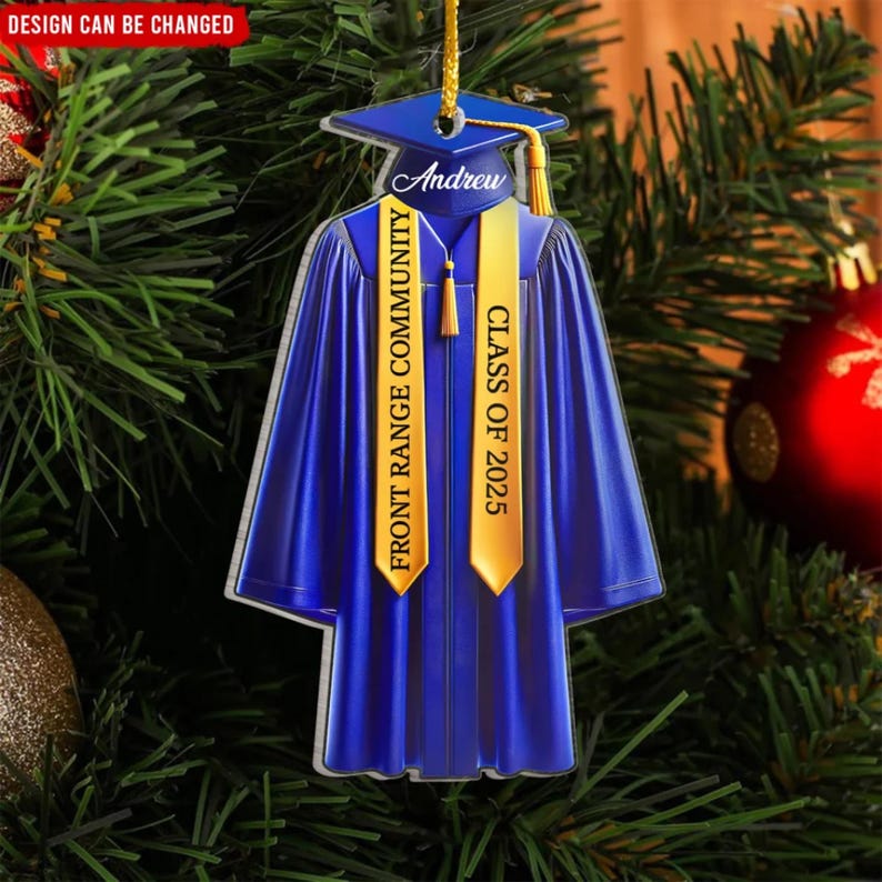 May include: Blue graduation cap and gown ornament with gold trim and the text "Andrew" and "Front Range Community Class of 2025".