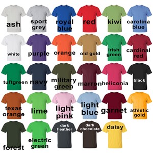 May include: A chart of 24 different t-shirt colors, including ash, sport grey, royal blue, red, kiwi, carolina blue, white, purple, orange, old gold, irish green, cardinal red, tuftgreen, navy, military green, marron, heliconia, black, texas orange, lime, light pink, light blue, garnet, athletic gold, forest green, dark heather, dark chocolate, and daisy.