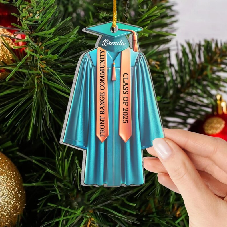 May include: A blue graduation cap and gown ornament with the text "Brenda" and "Front Range Community College Class of 2025" on it.