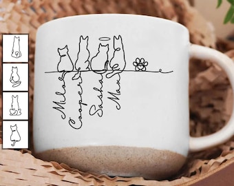 May include: White ceramic mug with a brown base, featuring a line drawing of four cats and a paw print. The names "Milo", "Cooper", "Sasha", and "Max" are written below the cats. The mug has a curved handle and the text "DESIGN CAN BE CUSTOMIZED" in a red banner.