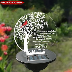 May include: A white silhouette of a tree with a red cardinal perched on a branch. The text reads "A limb has been fallen from the family tree I keep hearing a voice that says, Grieve not for me. Remember the best times, the laughter the song The good life I was strong, In loving memory Leah Nicole 1968-2023".