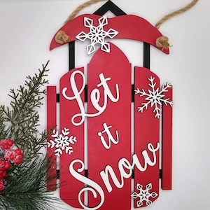 Colgador de puerta de trineo navideño SVG, Letrero láser "Let it Snow", Letrero de invierno SVG, Archivo de corte de decoración navideña, Copos de nieve SVG, Glowforge probado,