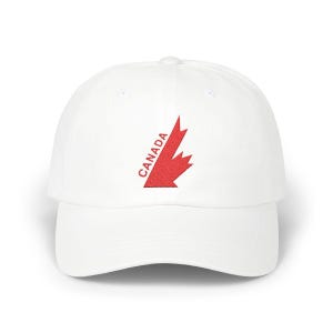 May include: White baseball cap with a red embroidered Canadian maple leaf and the word "CANADA" above it.