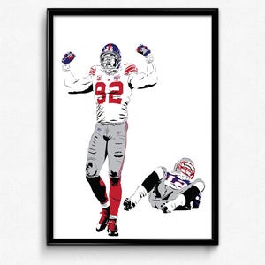May include: A framed art print featuring a stylized illustration of two football players. One player, wearing a white and red jersey with the number 92, stands with arms raised. The other player is on the ground.