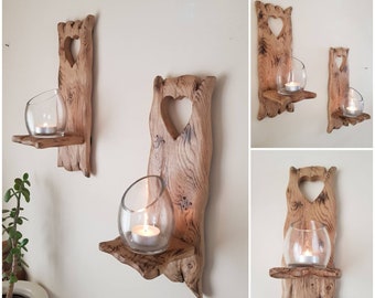 Rustic oak sconces with heart cut out detail . PAIR of handmade with waxed oak finish .Size 30 x 12 cm . candles / glass  not inc