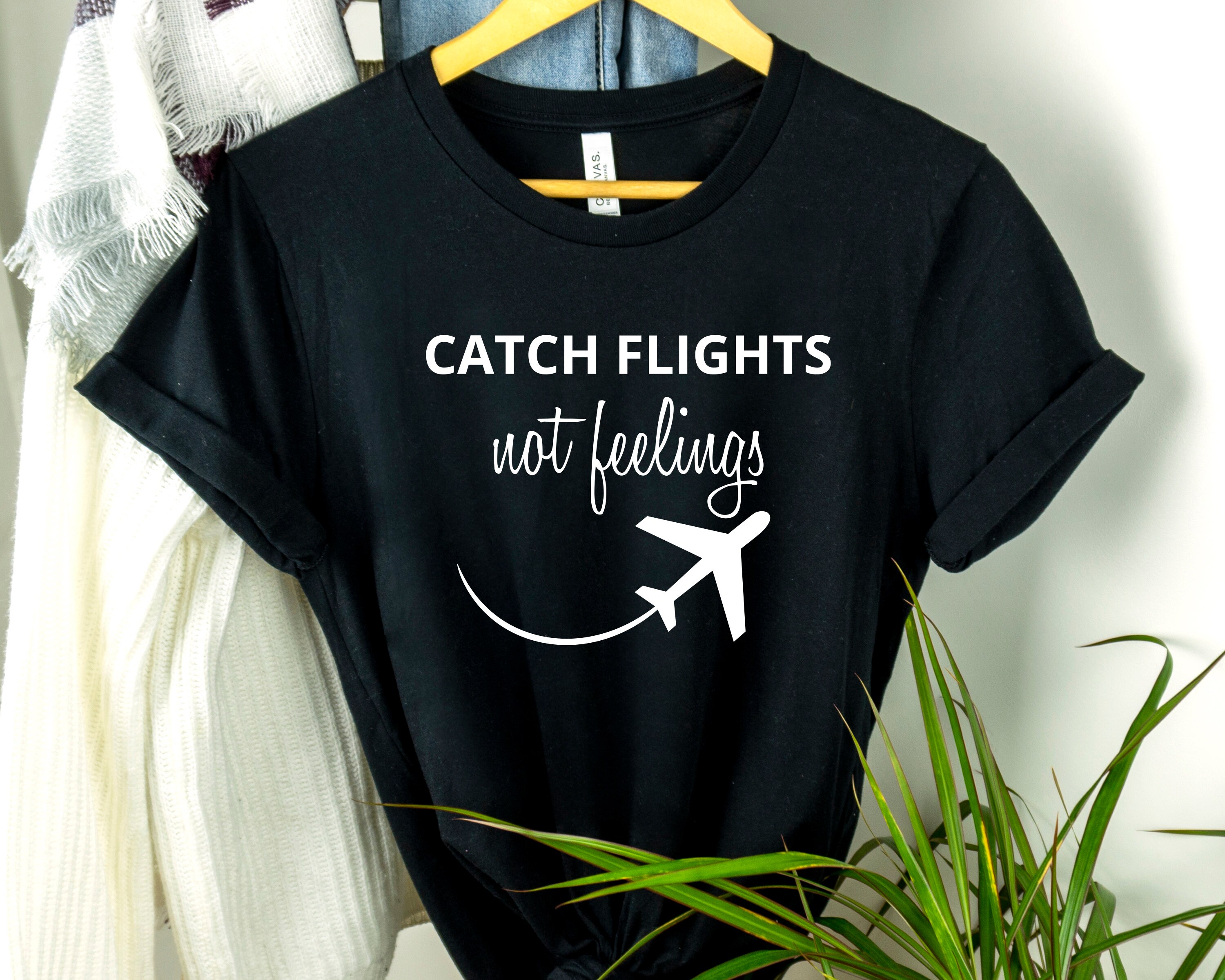 catching flights and feelings shirt